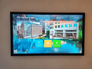 Digital directory board showing tenant search, amenities, and traffic information